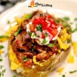 Loaded potatoes with beef ribs - text overlay.