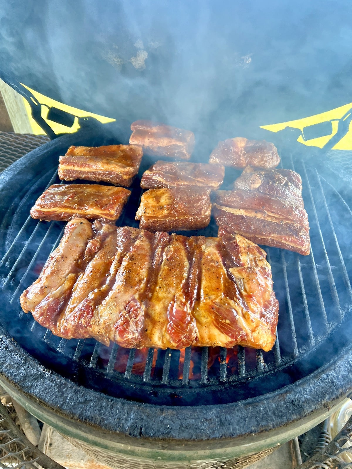 Beef ribs on a grill.