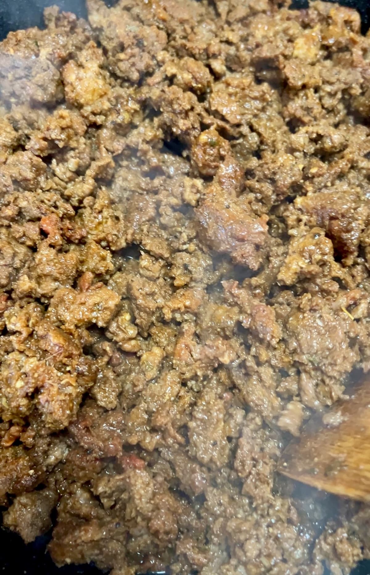 Smoky ground beef in a skillet.