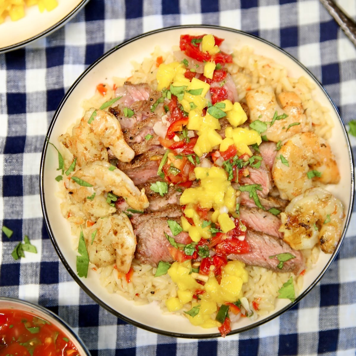 Rice bowl with steak and shrimp.