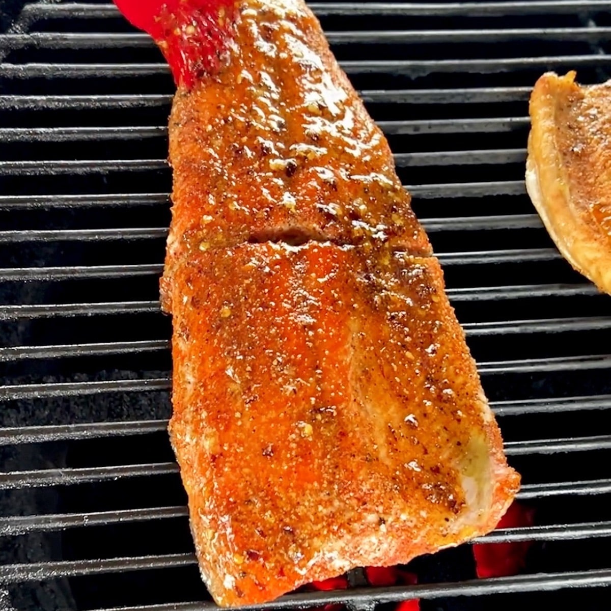 Grilling salmon with hot honey glaze.