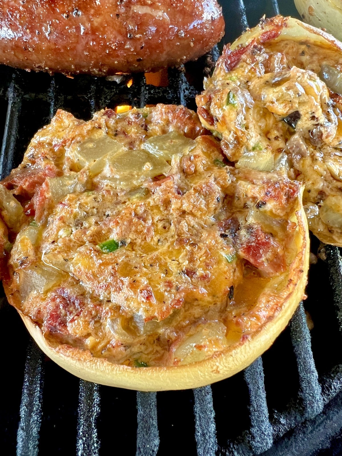 Grilled onions stuffed with brisket and cheese.