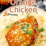 Grilled Orange Chicken on a plate with rice - text overlay.