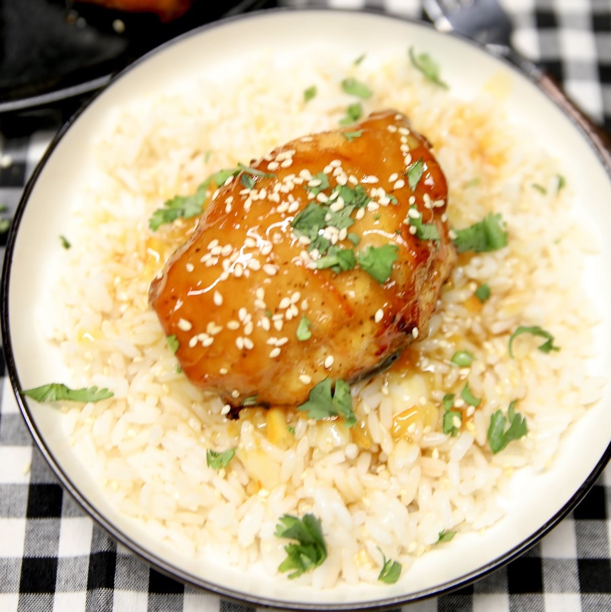 Plate of orange chicken and rice.