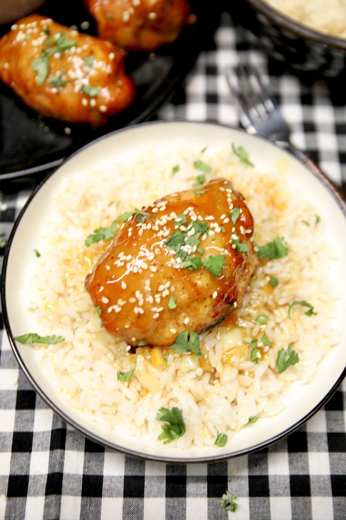 Plate of orange chicken and rice.