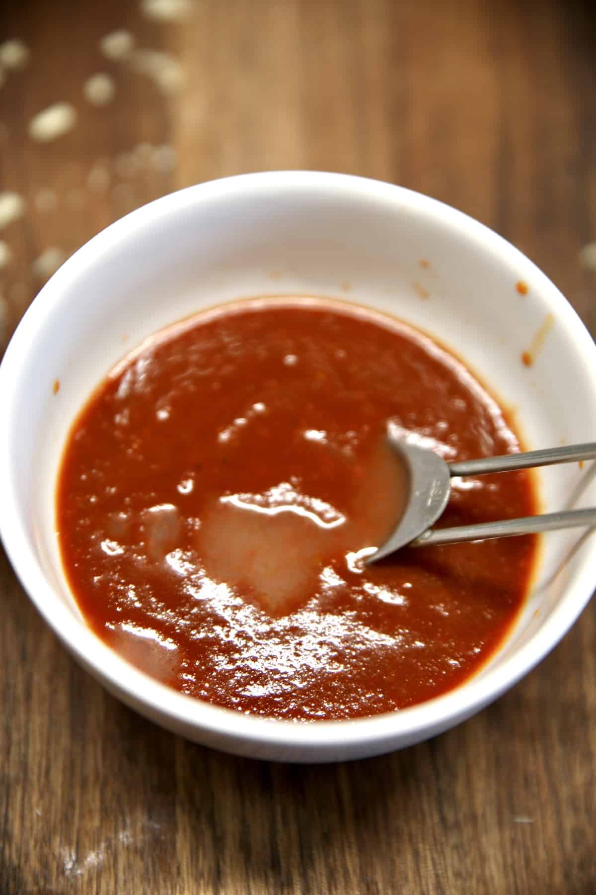 Bowl of chipotle sauce with lime juice.