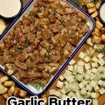 Steak bites charcuterie with cheese, bread, olives.