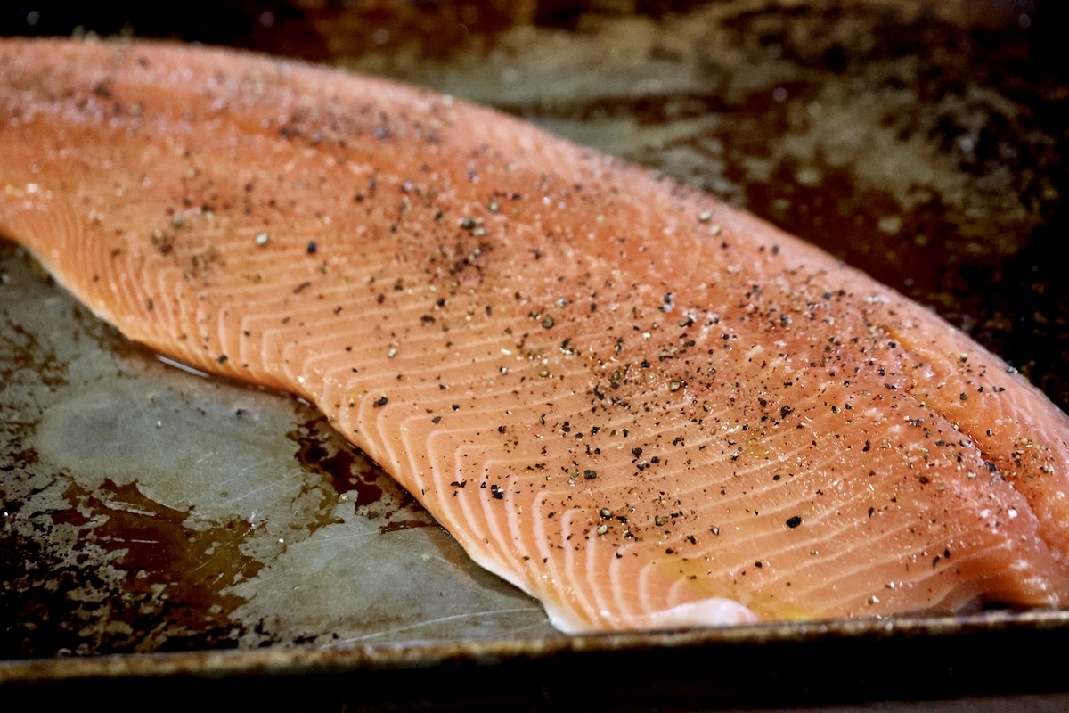 Salmon fillet with salt and pepper.