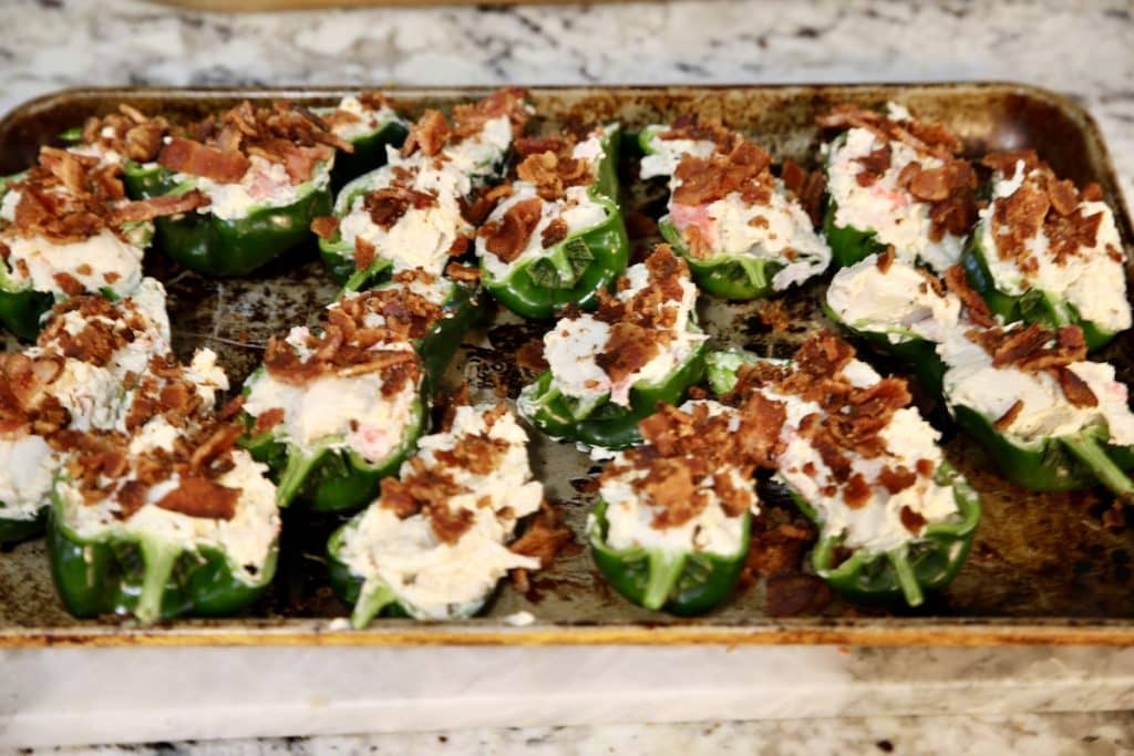 Crab rangoon stuffed poblanos with crispy bacon on top.