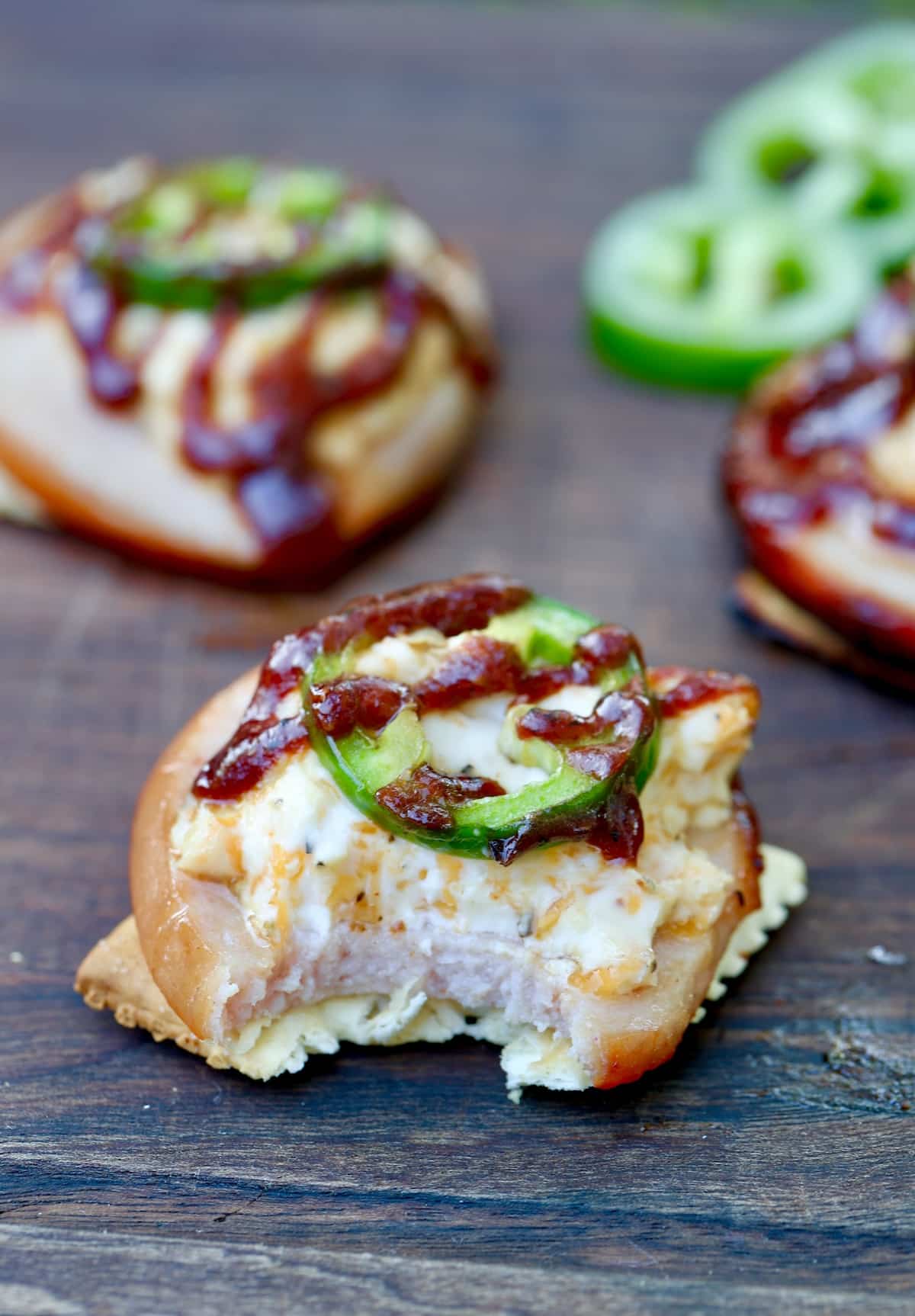 Crackers topped with smoked bologna slices, cream cheese, jalapeno & bbq sauce.