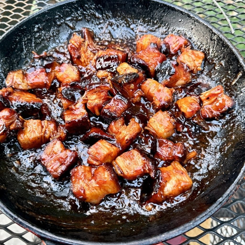BBQ Pork Belly Burnt Ends in a skillet.