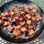 BBQ Pork Belly Burnt Ends in a skillet.