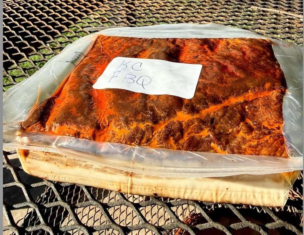 Seasoned pork belly in a package.